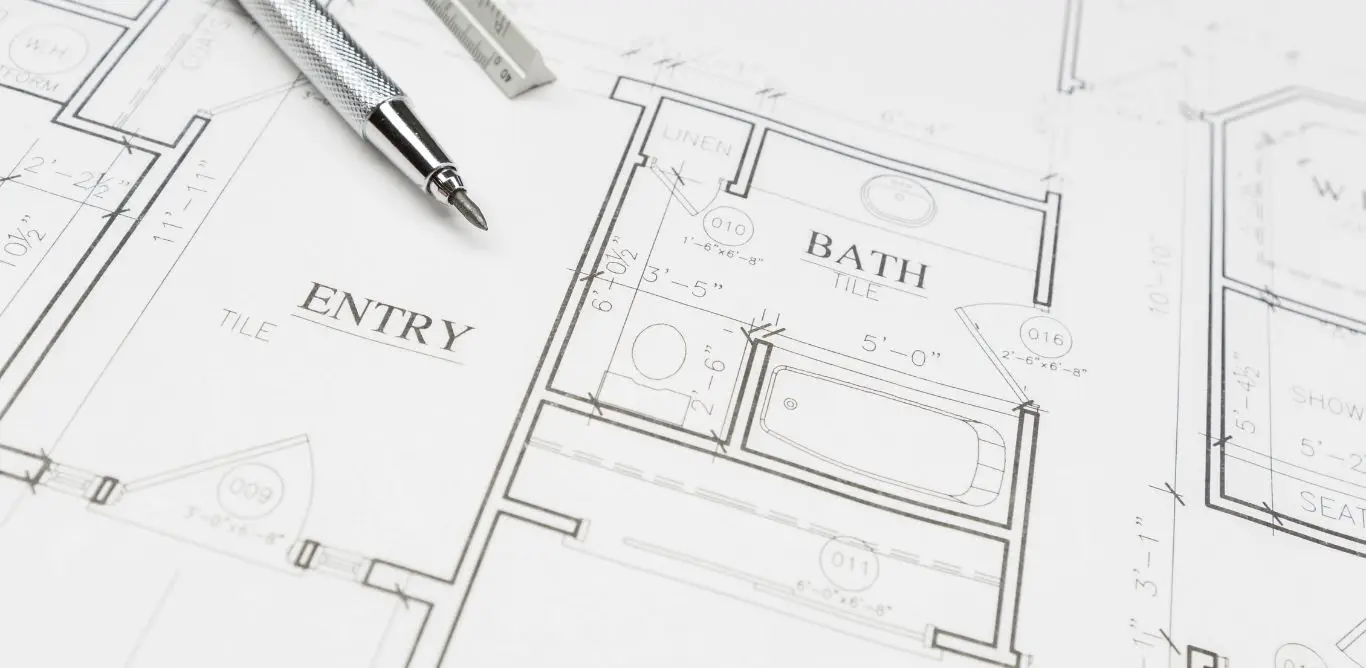 A bathroom renovation plan drawn on paper.