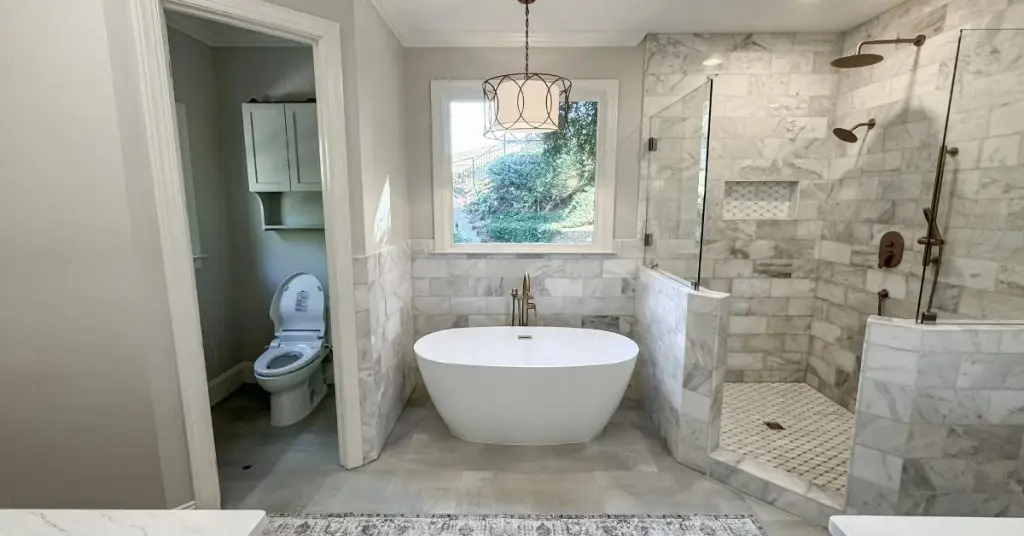 a room with a sink and a mirror