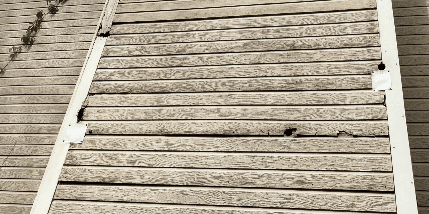 Water Damaged Masonite Siding