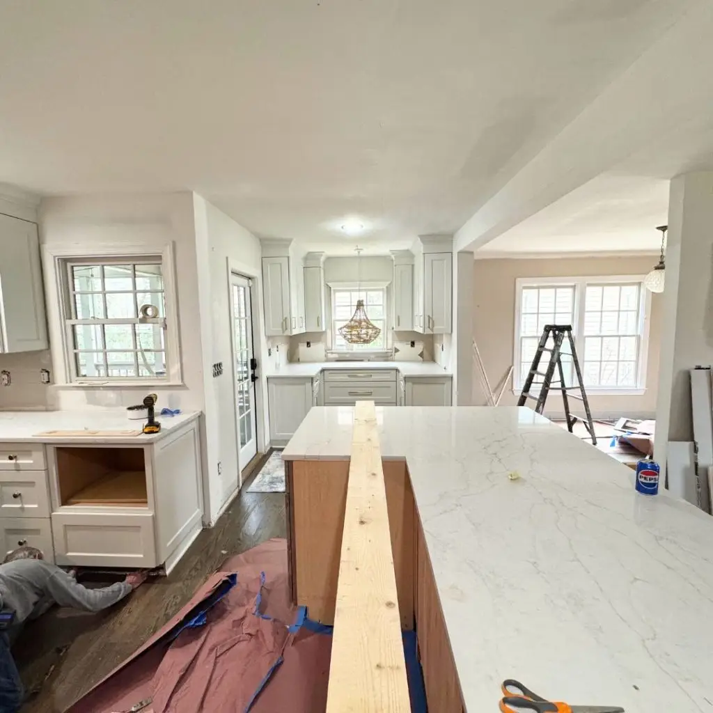 a room filled with furniture and a fireplace