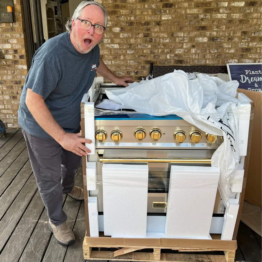 a man standing in front of a box