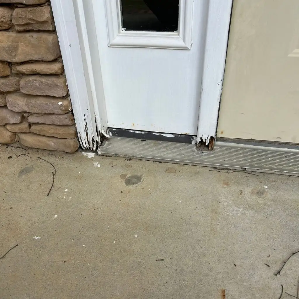 Water damage on a door frame in Hoover, AL.