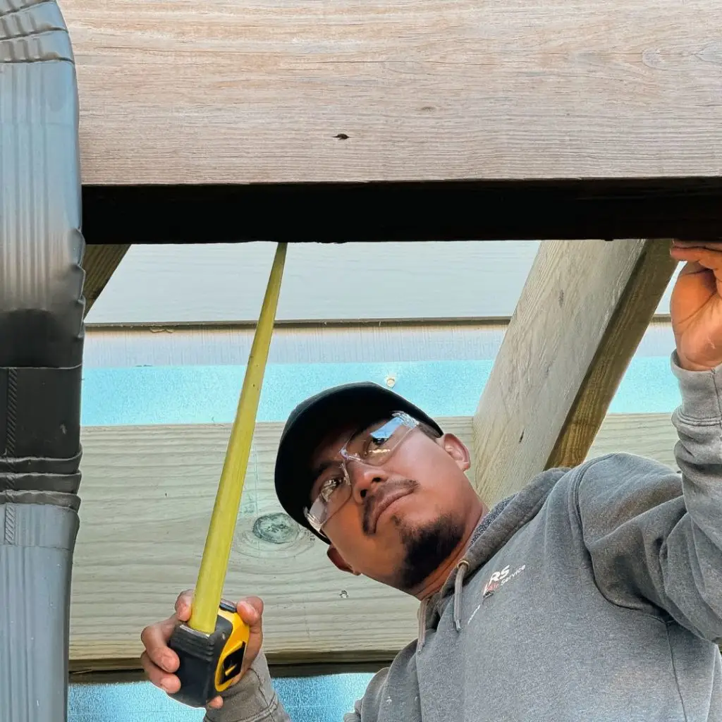An HRS worker providing handyman services for a client in Birmingham.