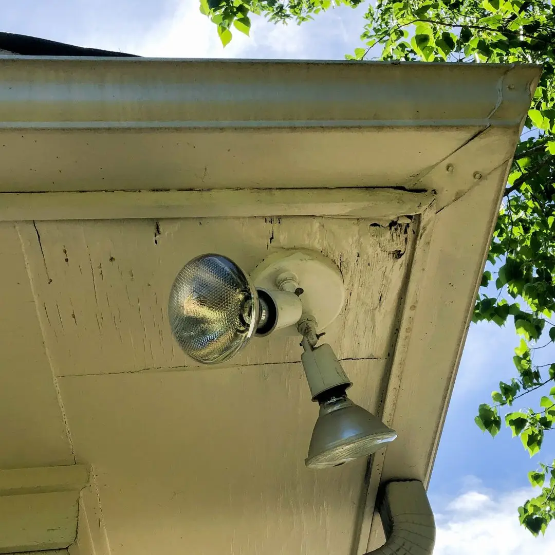 A rotten eave on a home in need of Soffit & Fascia Repair.