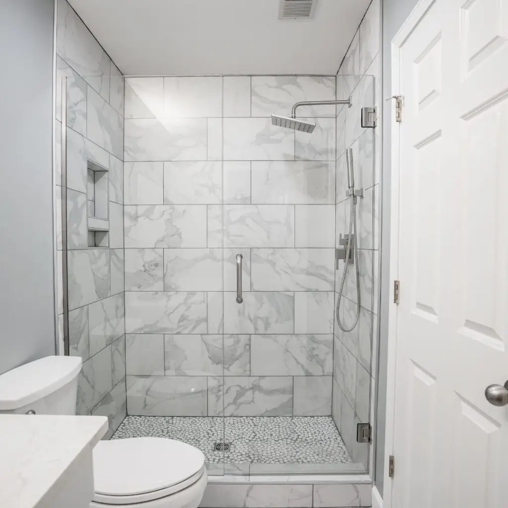 a room with a sink and a shower