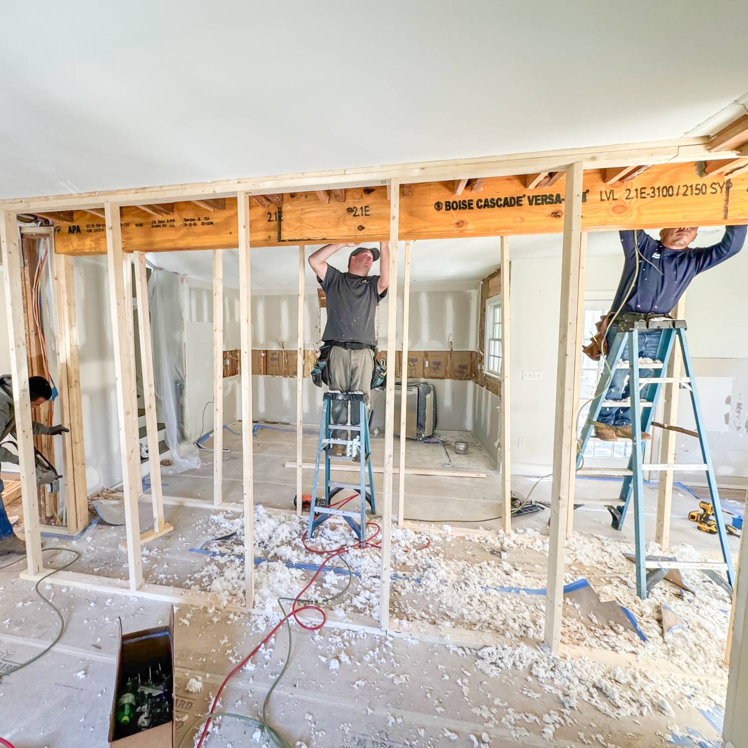 A major home remodeling in Vestavia Hills, AL, with a team framing an open-concept layout for better functionality.